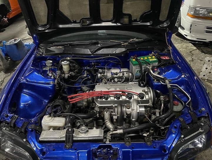 https://storage.googleapis.com/static_assets_iconicimports/dev_static/images/car_catalog/blue_civic_2.jpg