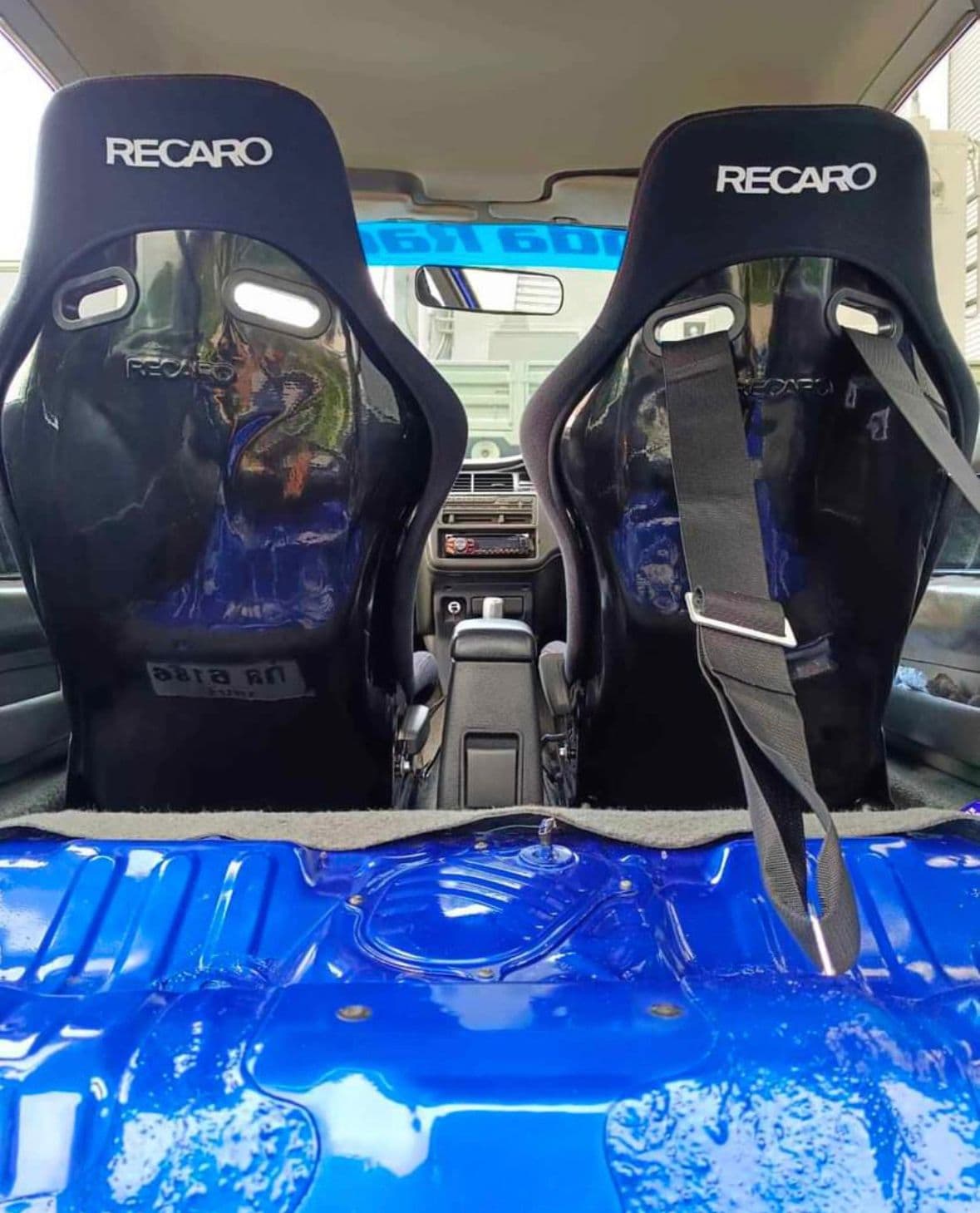 https://storage.googleapis.com/static_assets_iconicimports/dev_static/images/car_catalog/blue_civic_3.jpg