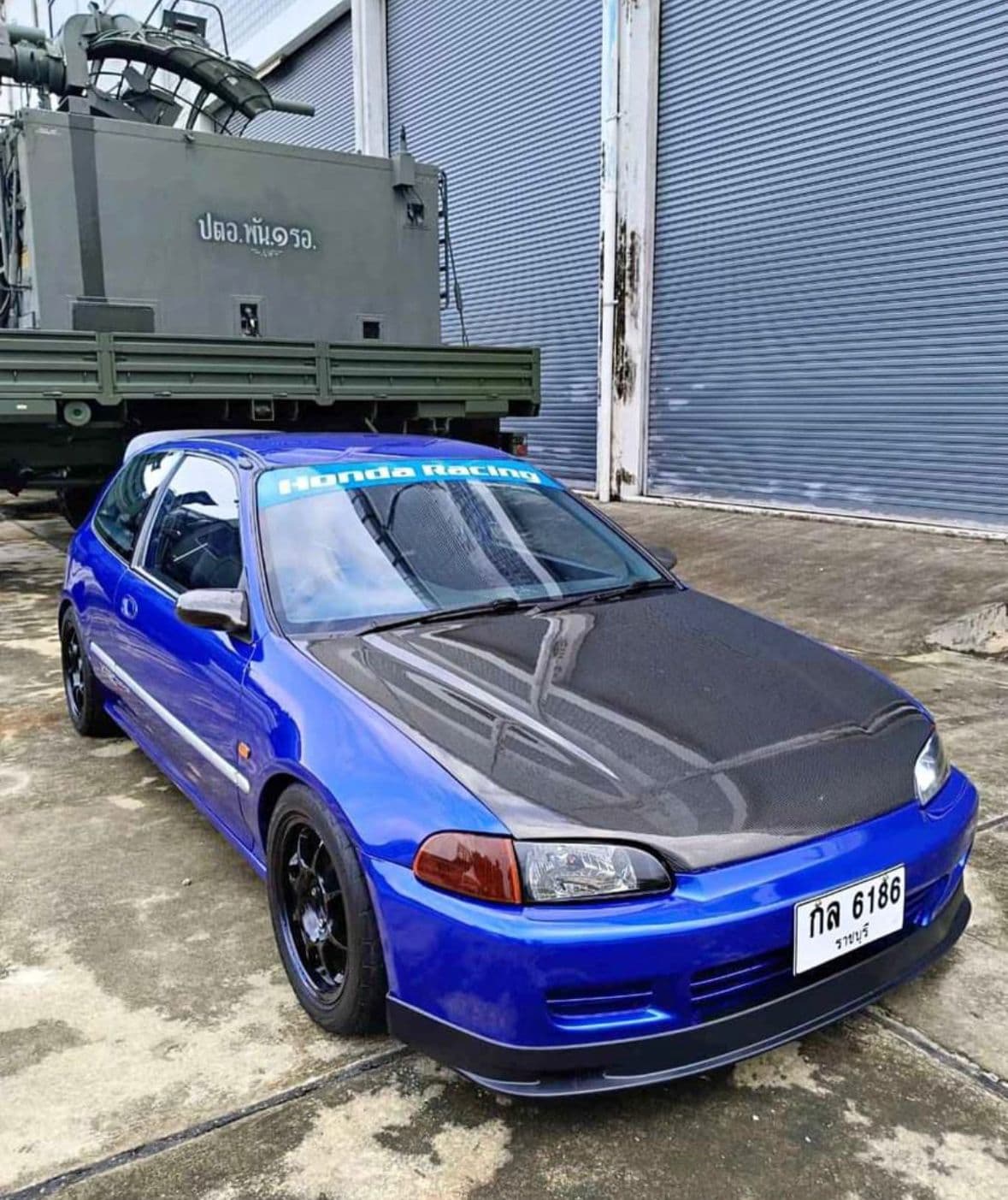 https://storage.googleapis.com/static_assets_iconicimports/dev_static/images/car_catalog/blue_civic_4.jpg