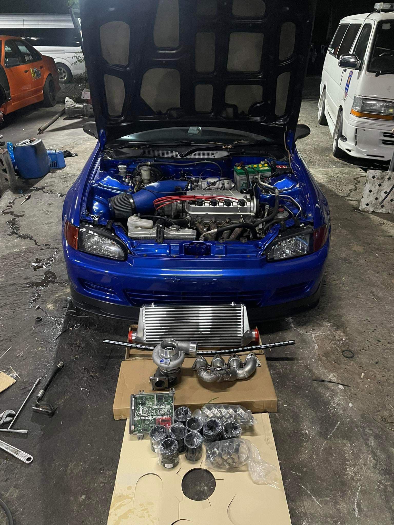 https://storage.googleapis.com/static_assets_iconicimports/dev_static/images/car_catalog/blue_civic_5.jpg